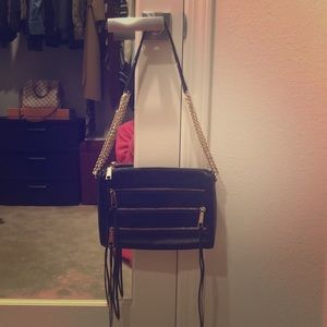 Rebecca Minkoff 5 zippers cross body bag.